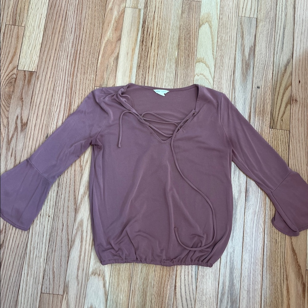 Xs, cute top with cross overs in the front